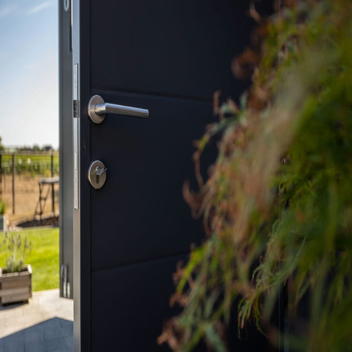 Close up of telluria insulated garden room safe and secure cylinder door lock