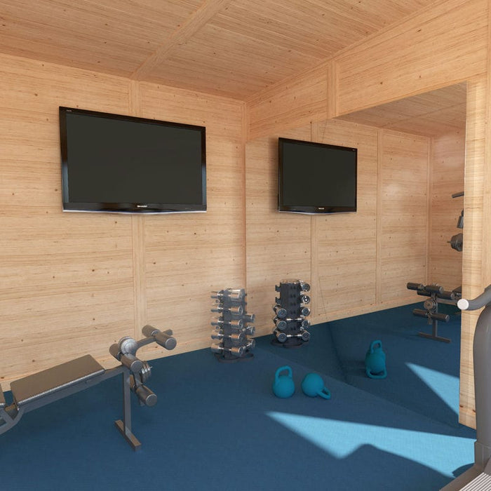 Inside of Mercia Harlow 5m x 4m insulated garden gym with gym equipment and TV