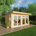 Mercia Edwinstowe Insulated Garden Room 4m x 4m white On a patio garden